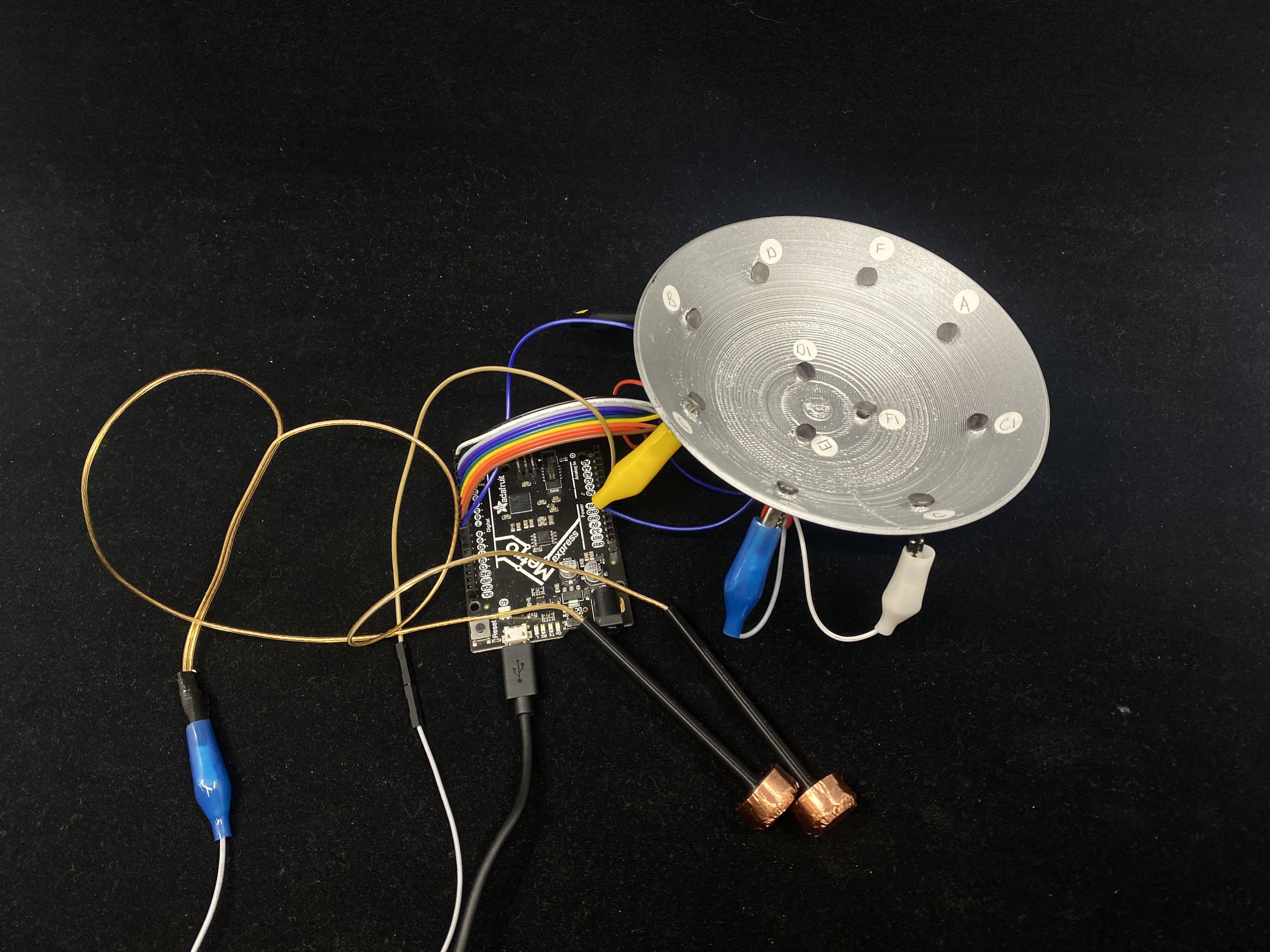 silver painted steelpan with wiring